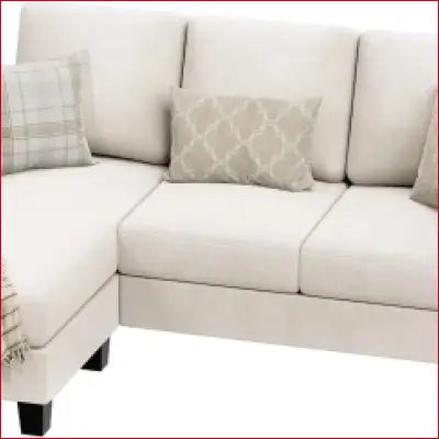 White convertible sectional sofa couch with throw pillows in linen fabric for small apartments