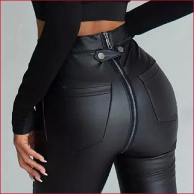 Tight black leather pants with fleece lining and crotch zipper detail for women