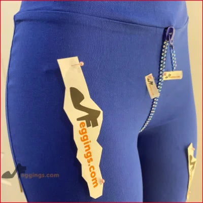 Blue spandex leggings with crystal crotch zipper and product tags, available in sizes S-6XL