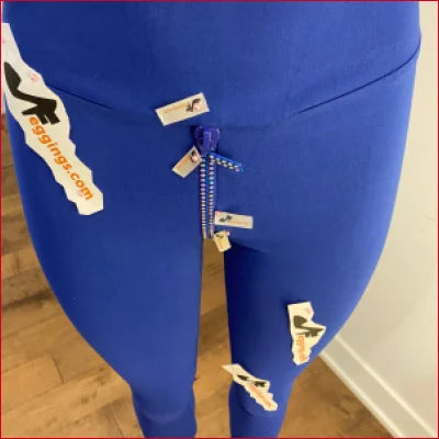 Bright blue Crystal Crotch Zipper leggings with tags near the zipper area