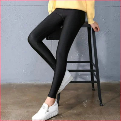 Sparkly Shiny Black Spandex Disco Leggings styled with white sneakers and a yellow top