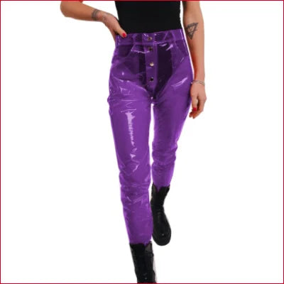 Bright purple disco styled vinyl plastic trousers featuring a high waist design