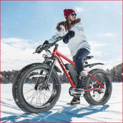 Red fat tire electric bike featuring 48V power for all terrain adventures