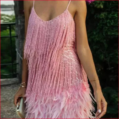 Pink fringed women’s dress with spaghetti straps in Roaring 20s-inspired style