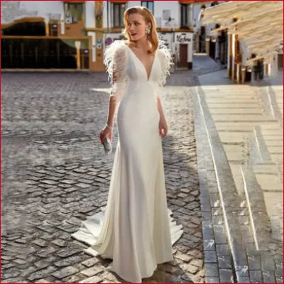 Elegant Feathers Wedding Dress in White with Feathered Sleeves and Plunging Neckline