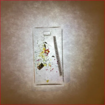 Light switch plate with colorful debris from Unique NFT Jewelry Nov 21st collection