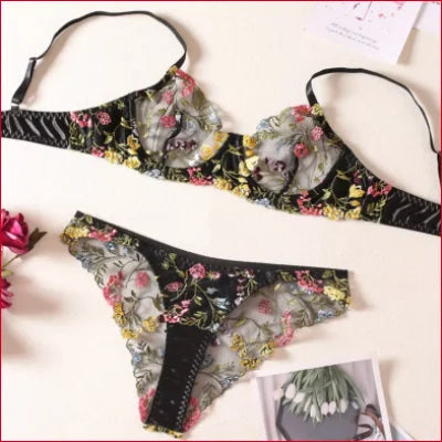 Floral print bra panties set featuring cat faces in vibrant colors and patterns