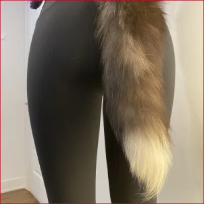 Furry foxtail attached to person wearing stylish black spandex leggings NFT from DeviantArt