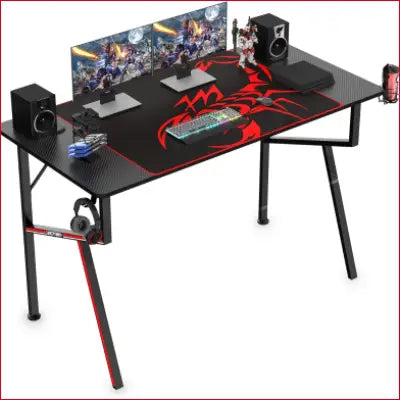 Gaming desk with accessories, featuring carbon fiber design and K shaped home office setup