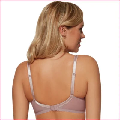 Pale pink Gossard Glossies Lace Sheer Mesh Bra on a person with blonde hair from the back