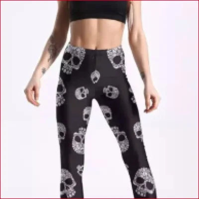 Black Gothic Skull Leggings featuring a striking skull pattern on black fabric for dark fashion statement