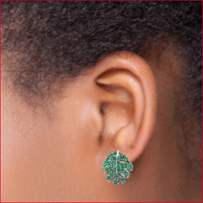 Sterling Silver Green Leaf Stud Earrings featuring elegant green gemstones