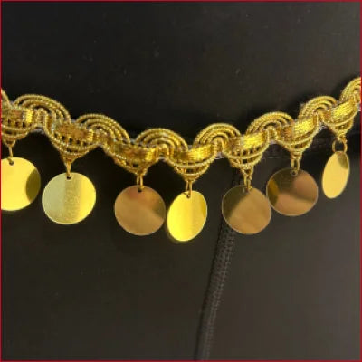 Gold-colored chain bracelet with circular charms for Gypsy Black leggings in Supplex Lycra