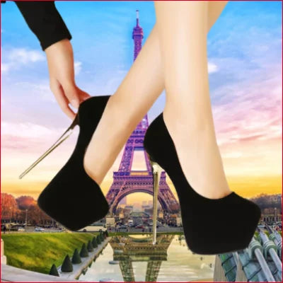 Black high-heeled platform shoes in black micro suede with the Eiffel Tower backdrop