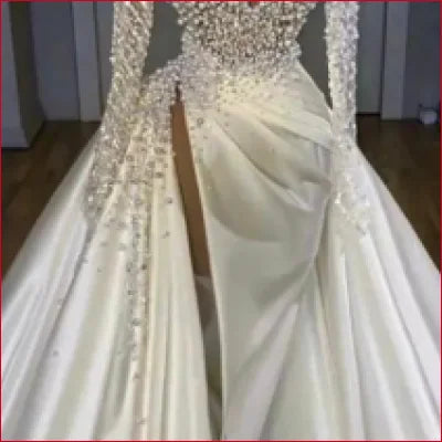 Wow High Slit Pearls Wedding Dress featuring an ornate gown with intricate beading