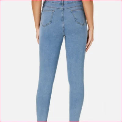 Light blue high rise slim fit jeans displayed from the back view