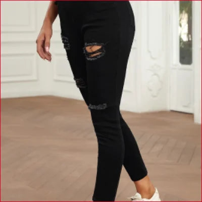 High Waist Ripped Skinny Jeans featuring black distressed design and thigh rips