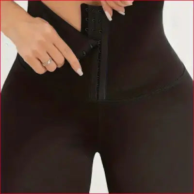Black shapewear leggings featuring high waist skinny fit and tummy control for women