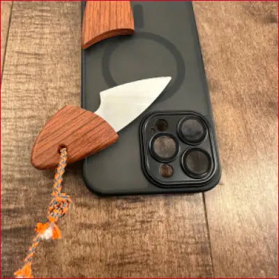 IPhone 14 Plus black case with attached wooden-handled box letter opener