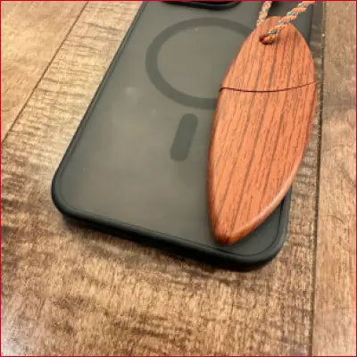 Wooden surfboard-shaped pendant on Black Case Box Letter Opener product display