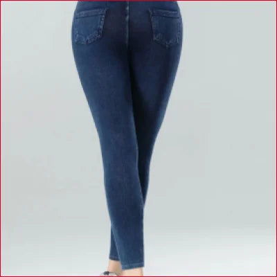 Dark blue skinny jeggings jean leggings worn on a person’s lower body for a stylish look