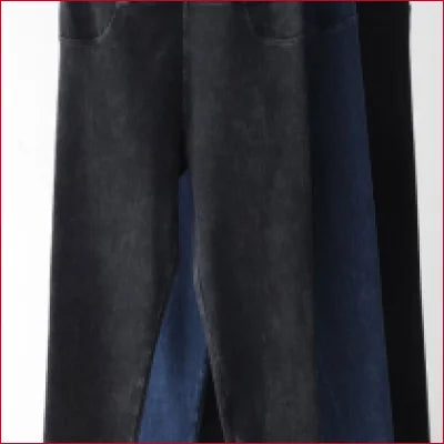 Stylish Jeggings Jean Leggings featuring a pair of dark trousers with a bottom slit