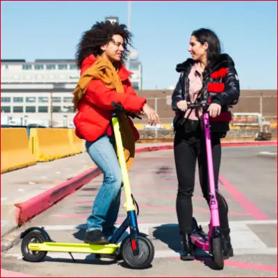 Two people enjoying the Journey Electric Scooter at 14MPH with a 5HR charge