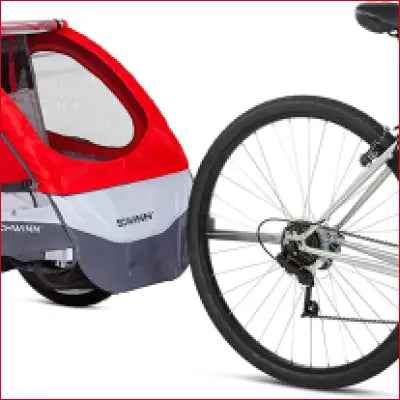 Red and gray Joyrider Echo child bike trailer for safe family cycling adventures