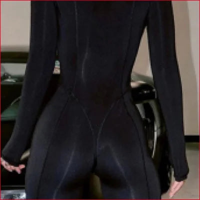 Black bodysuit viewed from behind, featuring a crotch zipper, ideal lingerie option