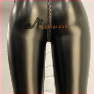 Stylish Black Vegan Leather Crotch Zipper Leggings with shiny black latex finish