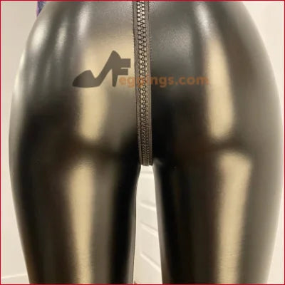 Stylish Black Vegan Leather Crotch Zipper Leggings featuring shiny black latex with a back zipper