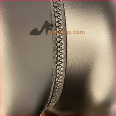 Metal zipper with interlocking teeth on Stylish Black Vegan Leather Crotch Zipper Leggings