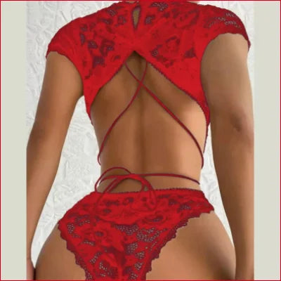 Red lace keyhole bodysuit featuring an open back design and criss-cross straps