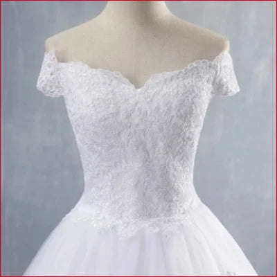 Off-the-shoulder white lace wedding dress bodice for a wedding dress princess look