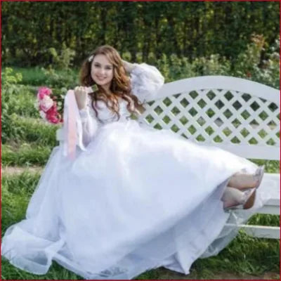 Gorgeous Lace Off Shoulder Bridal Gown in White with Long Sleeves and Flowing Skirt