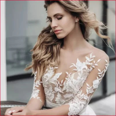 Elegant Lace Wedding Dress Bridal Gown with intricate lace detailing and sheer elements