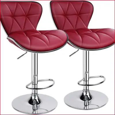 Two red adjustable bar stools from the Leader Shell Bar Stools Set, featuring a swivel design