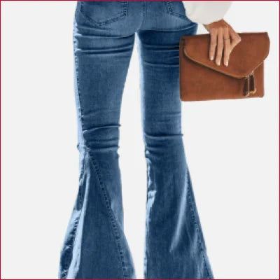 Pair of flared blue jeans with a brown leather clutch for Vintage Leopard Patchwork style