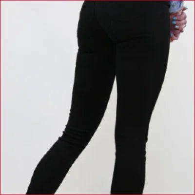 Classic Black Skinny Jeans with Stretch Denim Comfort worn on legs for a stylish look