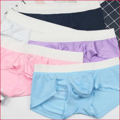 Assortment of Snug Men’s Pouch Underwear in colorful pastel shades for ultimate comfort