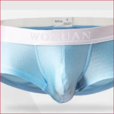 Light blue snug men’s pouch underwear with white WO MILAN waistband displayed