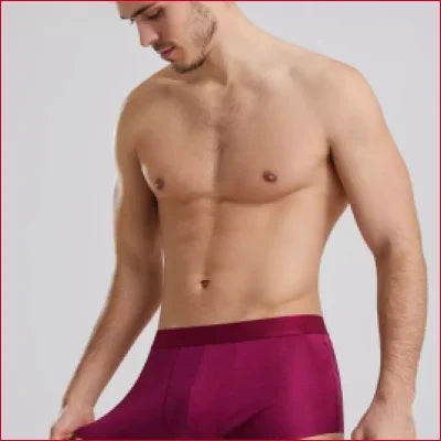 Muscular male torso in burgundy boxer briefs from Luxurious Mulberry Silk Underwear