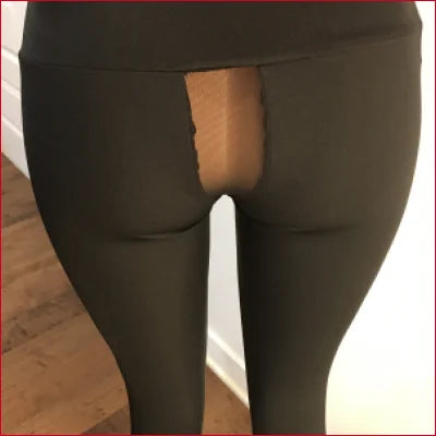 Rectangular object in back pocket of Exhibitionnisme Sheer Mesh Crotch Leggings