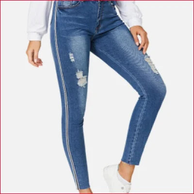 Distressed blue skinny jeans with white stripes for a flattering fit and crotch zipper