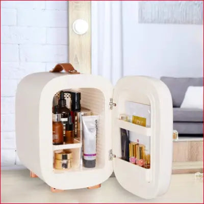 Open cream-colored Qubi Mini Fridge, a professional compact fridge for skincare products