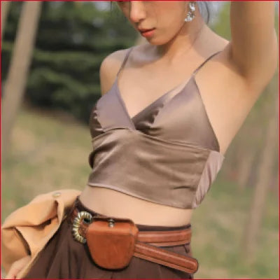 Woman in silky taupe camisole highlights luxurious Mulberry Silk Bra collection