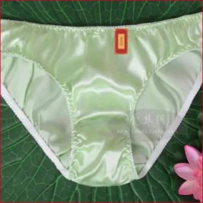 Pale green Mulberry Silk Panties for women featuring a small red tag