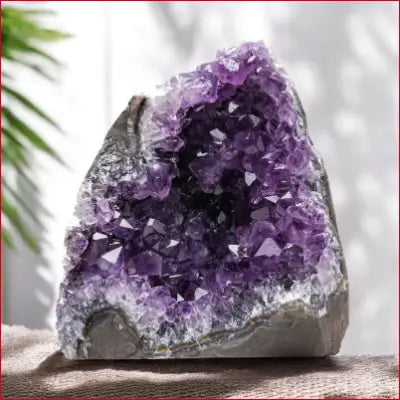 Natural Amethyst geode showcasing deep purple crystal clusters from Uruguay, 4 to 7 inches