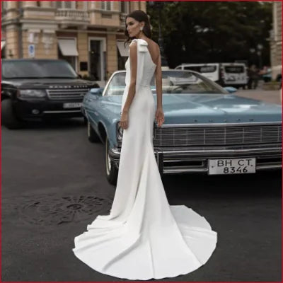 Elegant Off Shoulder Wedding Dress in White with Long Sweep Train and Sleeveless Design