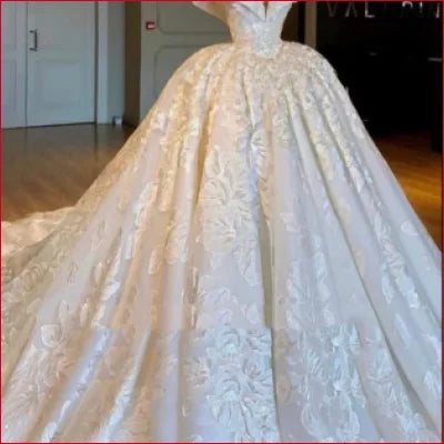 Ornate Princess Off Shoulder Wedding Dress bridal gown with lace detailing and voluminous skirt